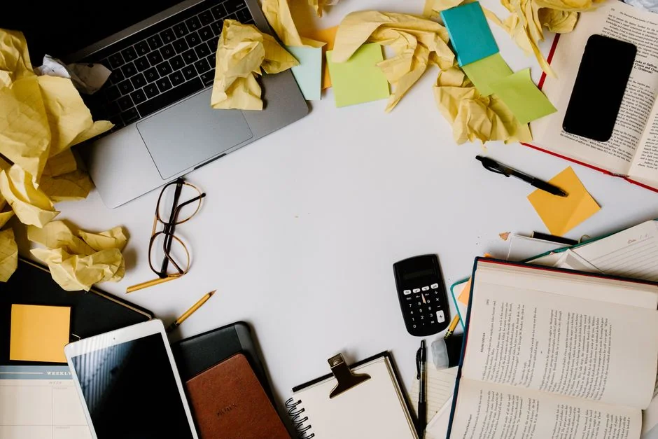 Close-up of a woman working on a digital marketing project in a home office setting.